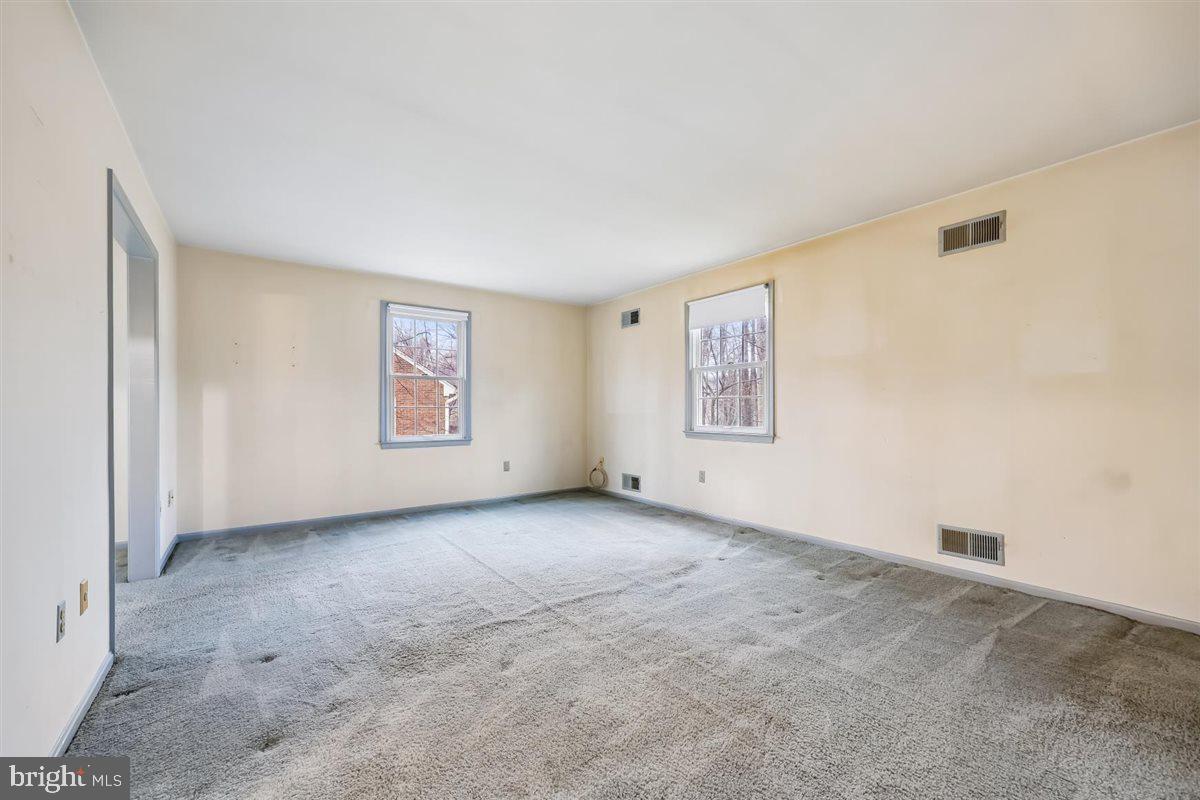 13724 Bridgewater Drive Silver Spring, MD 20904 - Photo 51 of 99 a view of an empty room with a window