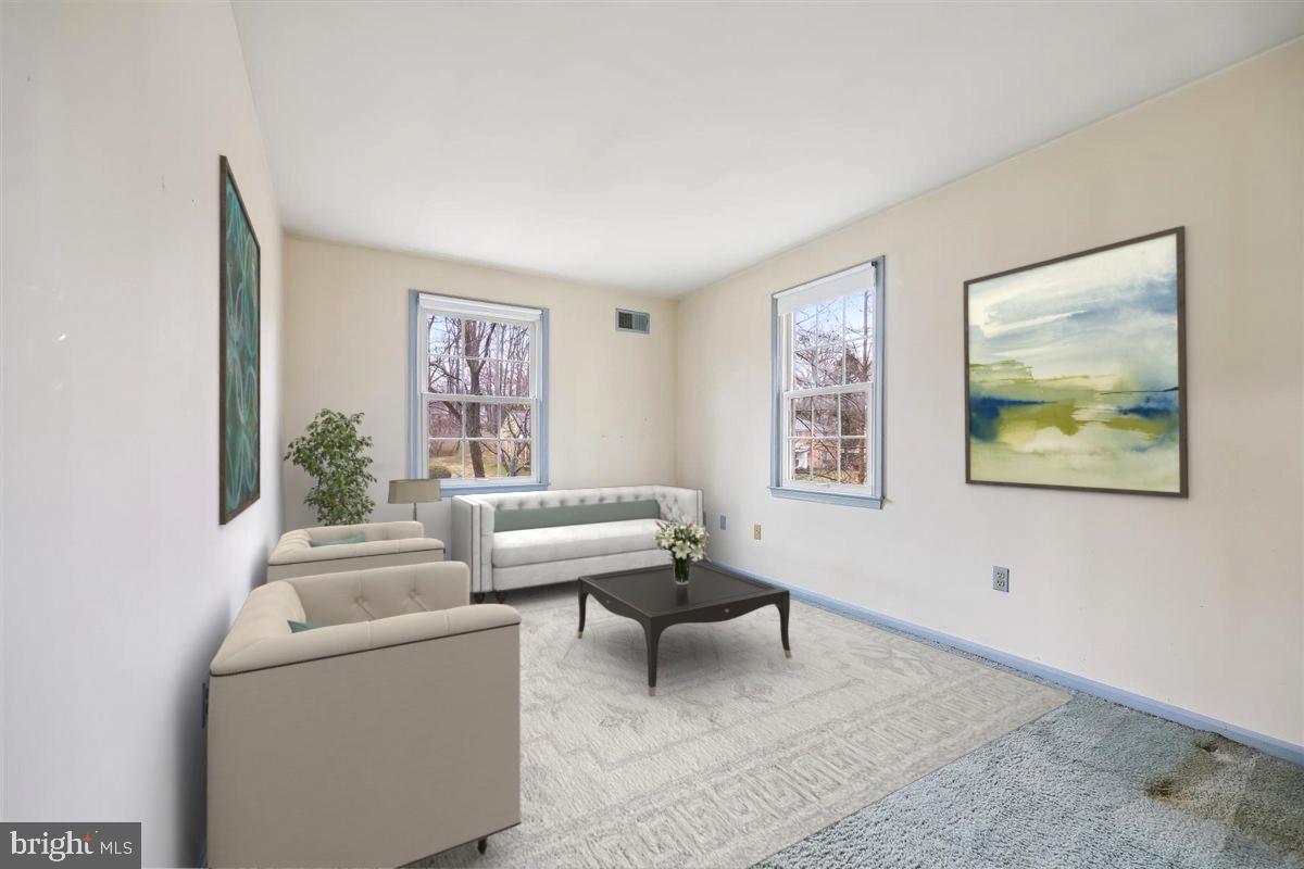 13724 Bridgewater Drive Silver Spring, MD 20904 - Photo 56 of 99 a living room with furniture and a window