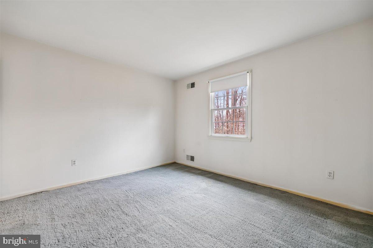 13724 Bridgewater Drive Silver Spring, MD 20904 - Photo 72 of 99 a view of an empty room with a window