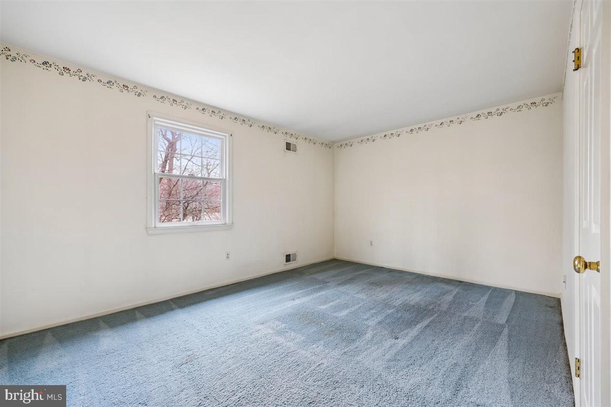 13724 Bridgewater Drive Silver Spring, MD 20904 - Photo 75 of 99 a view of an empty room with a window