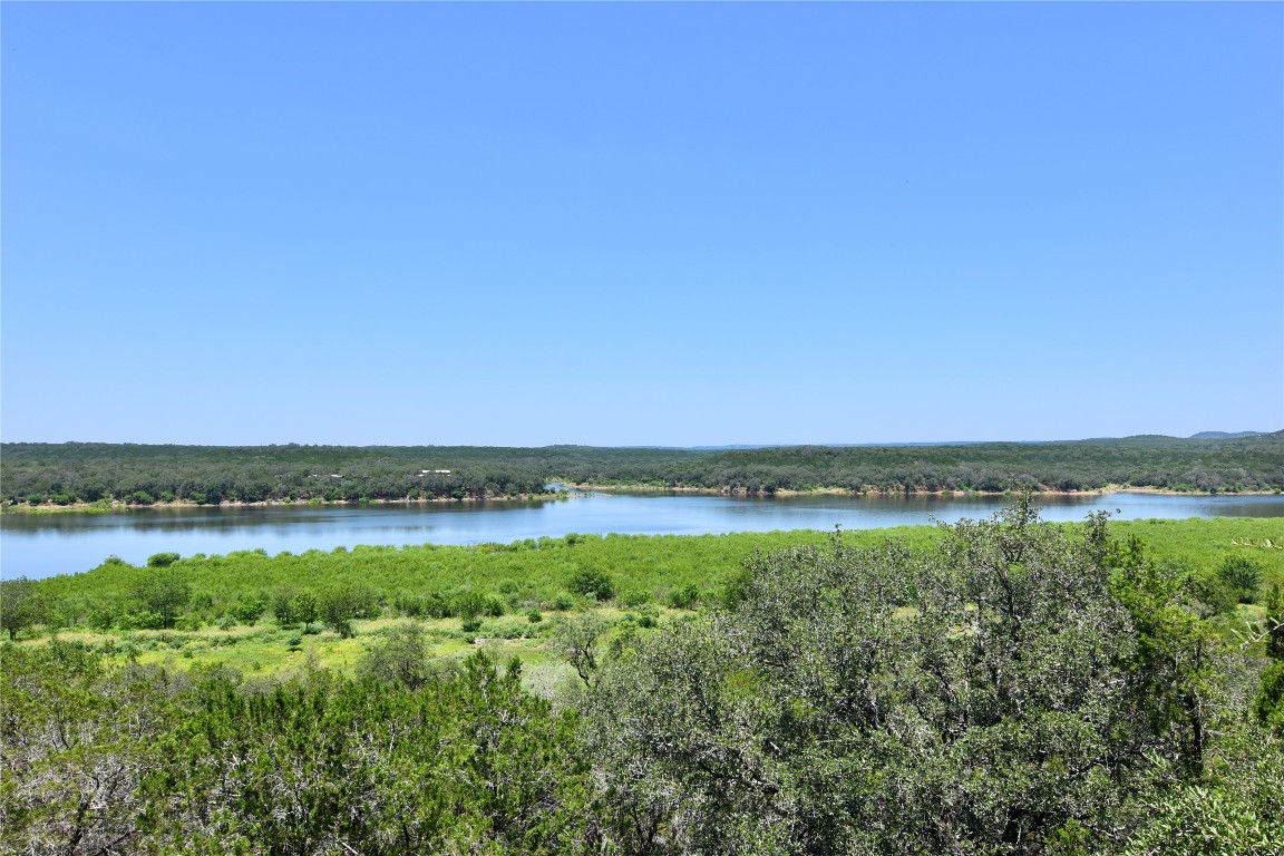 633 Wesley Ridge Drive Spicewood, TX 78669 - Photo 2 of 40 Your daily Lake Travis backdrop framed by Texas Hill Country beauty on the horizon.