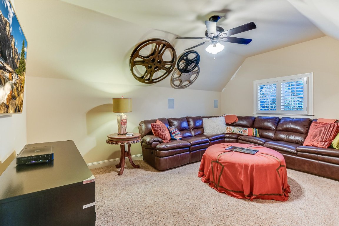 633 Wesley Ridge Drive Spicewood, TX 78669 - Photo 23 of 40 Currently a media room, this versatile space can easily be transformed into a dedicated office or workout area to suit your needs.