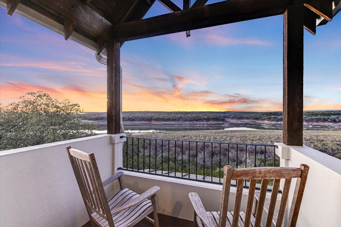 633 Wesley Ridge Drive Spicewood, TX 78669 - Photo 26 of 40 There are sweeping views of Lake Travis from this private balcony. Views stretch across the landscape, doubling the stunning vista before you.