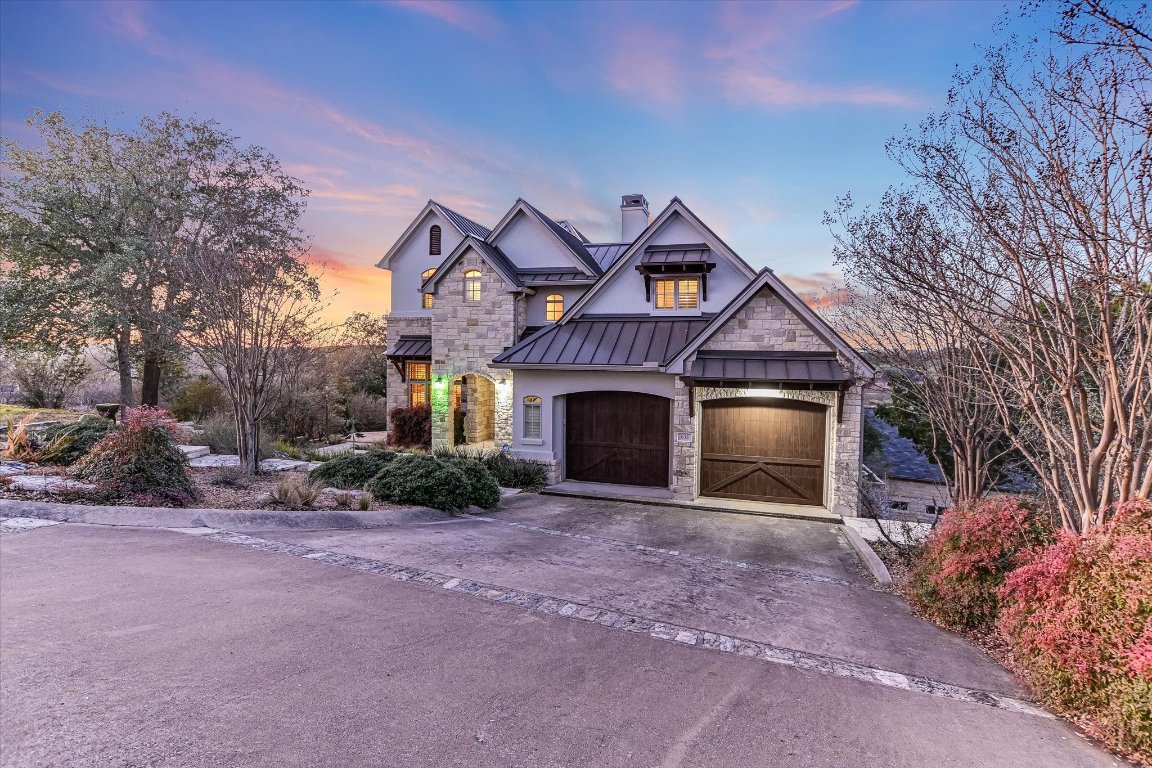 633 Wesley Ridge Drive Spicewood, TX 78669 - Photo 3 of 40 Overlooking Lake Travis, this stunning home is a spacious private retreat with an abundance of upgrades and first class finishes.