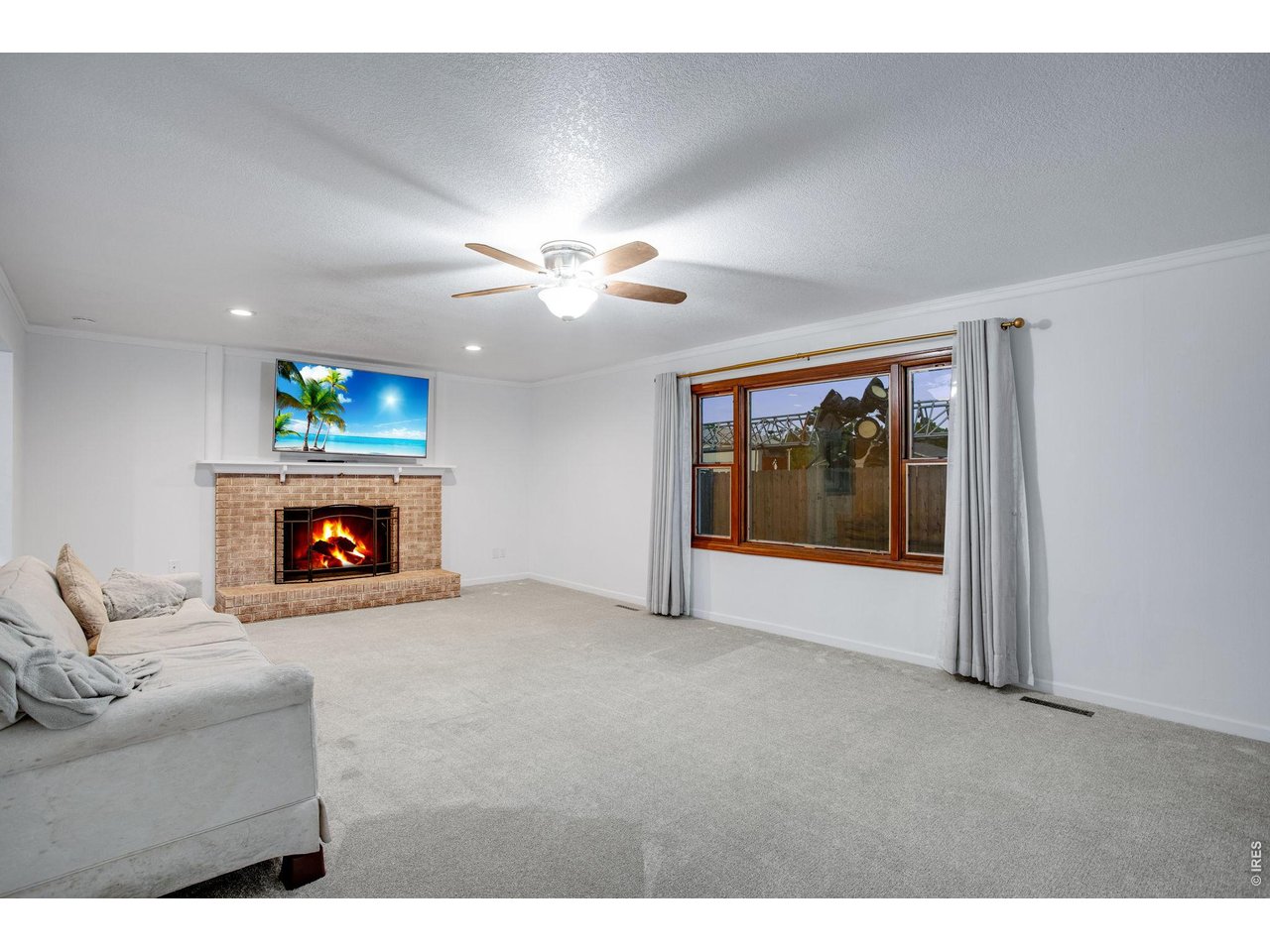 5416 South Timberline Road Fort Collins, CO 80528 - Photo 17 of 50 Full length living room with gas fireplace