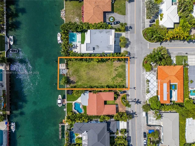 an aerial view of a house with a garden