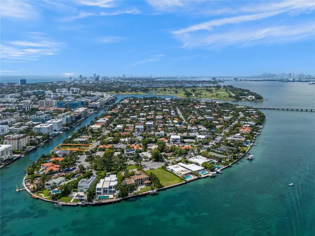 an aerial view of a golf course with parking space