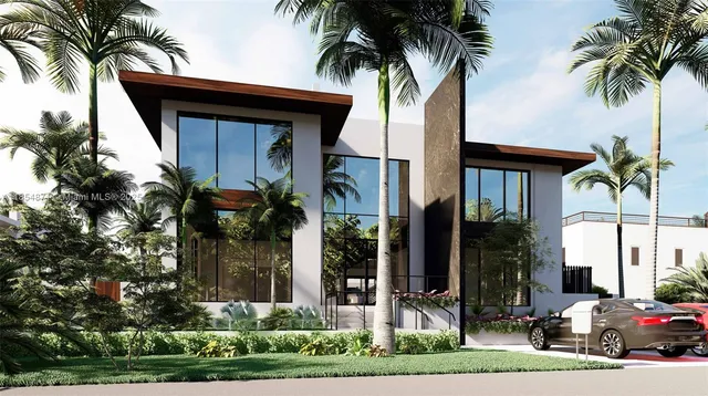 a couple of palm trees in front of house