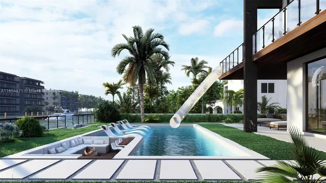 a view of a swimming pool with a garden and deck