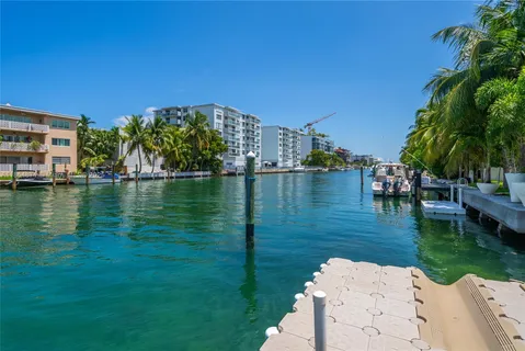a view of a lake with a building in front of it