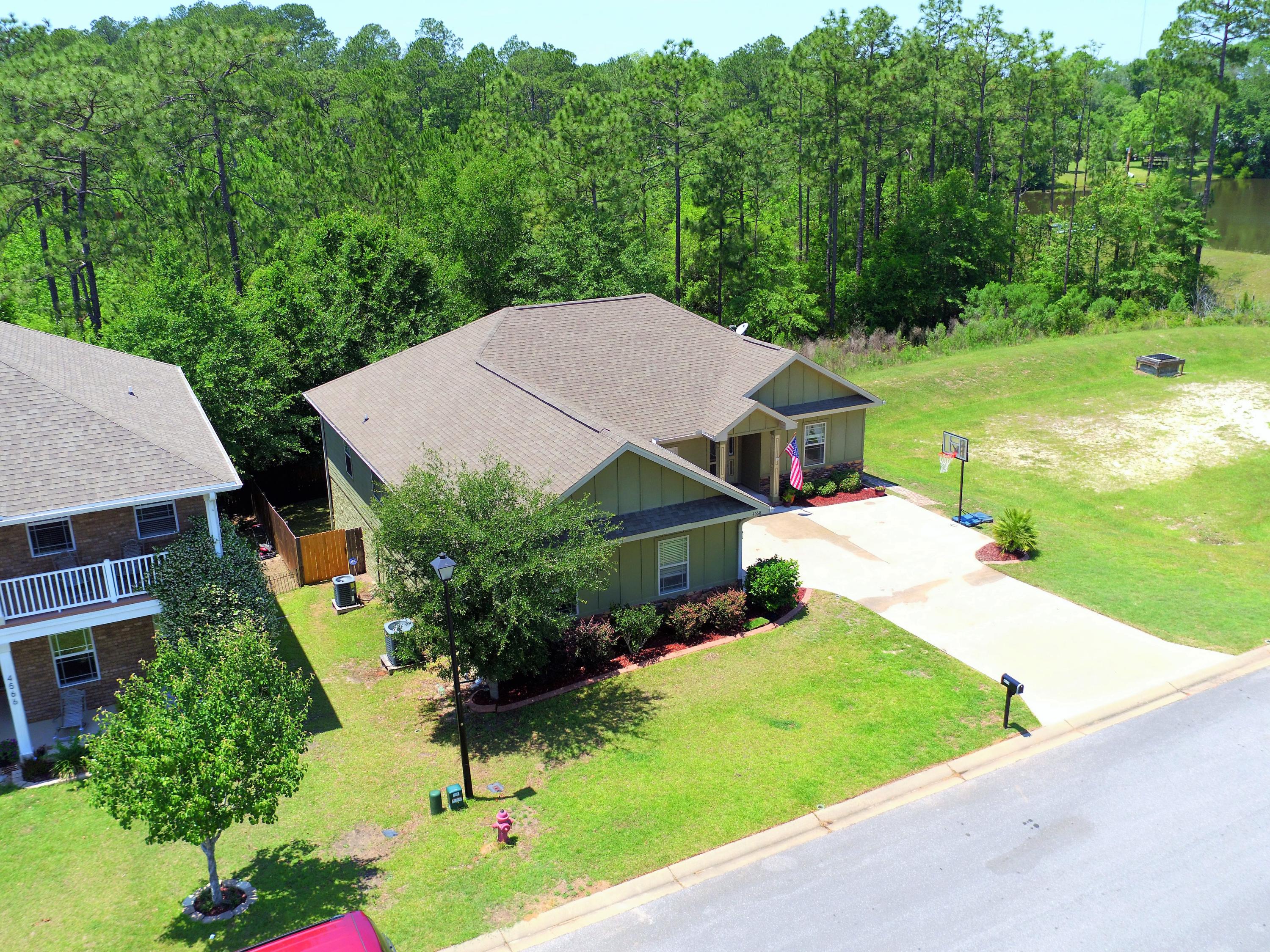 4568 Hermosa Road Crestview, FL 32539 - Photo 2 of 51 an aerial view of a house