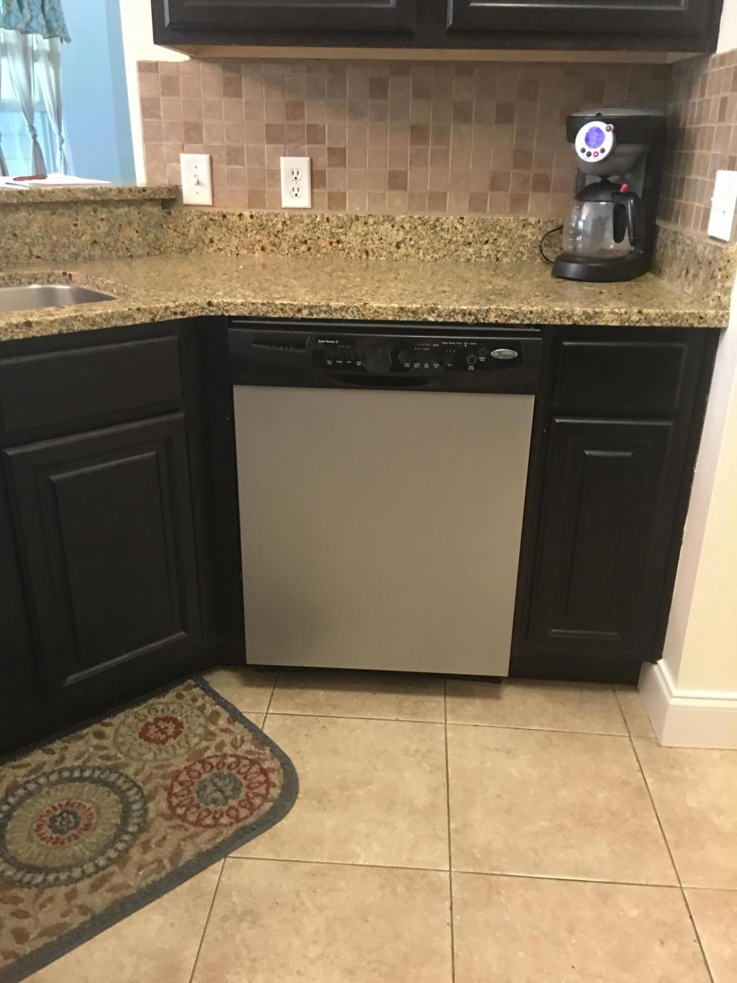 4568 Hermosa Road Crestview, FL 32539 - Photo 13 of 51 a kitchen with granite countertop a sink and a stove