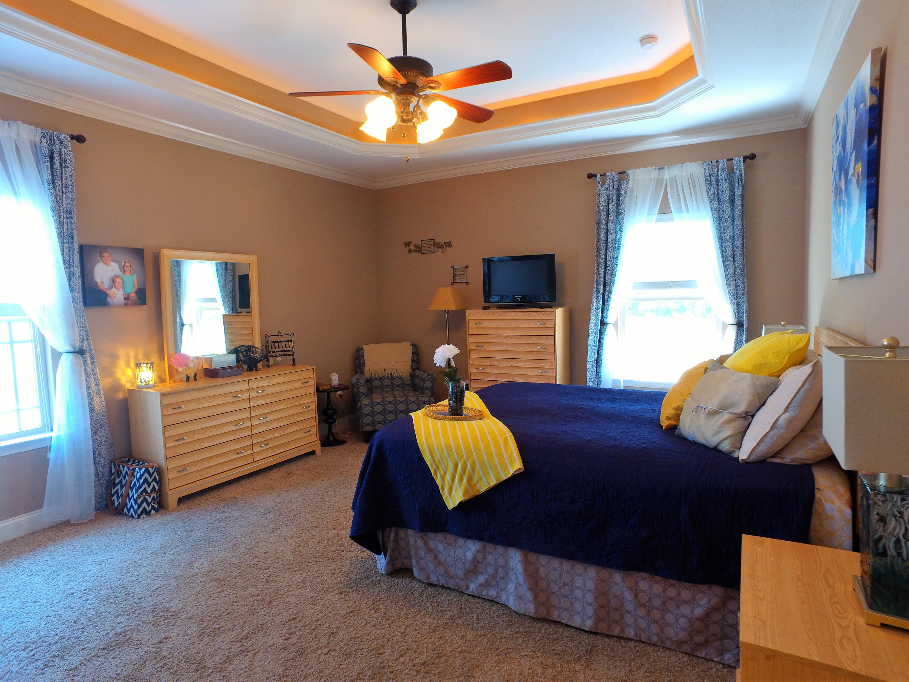 4568 Hermosa Road Crestview, FL 32539 - Photo 17 of 51 a bedroom with furniture and a window