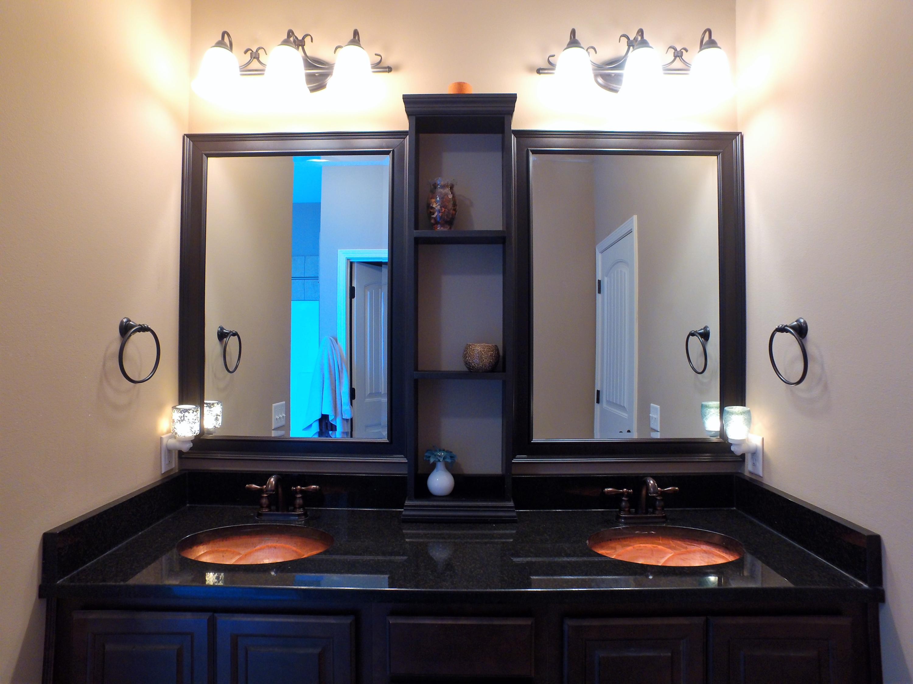 4568 Hermosa Road Crestview, FL 32539 - Photo 19 of 51 a bathroom with a sink and a mirror