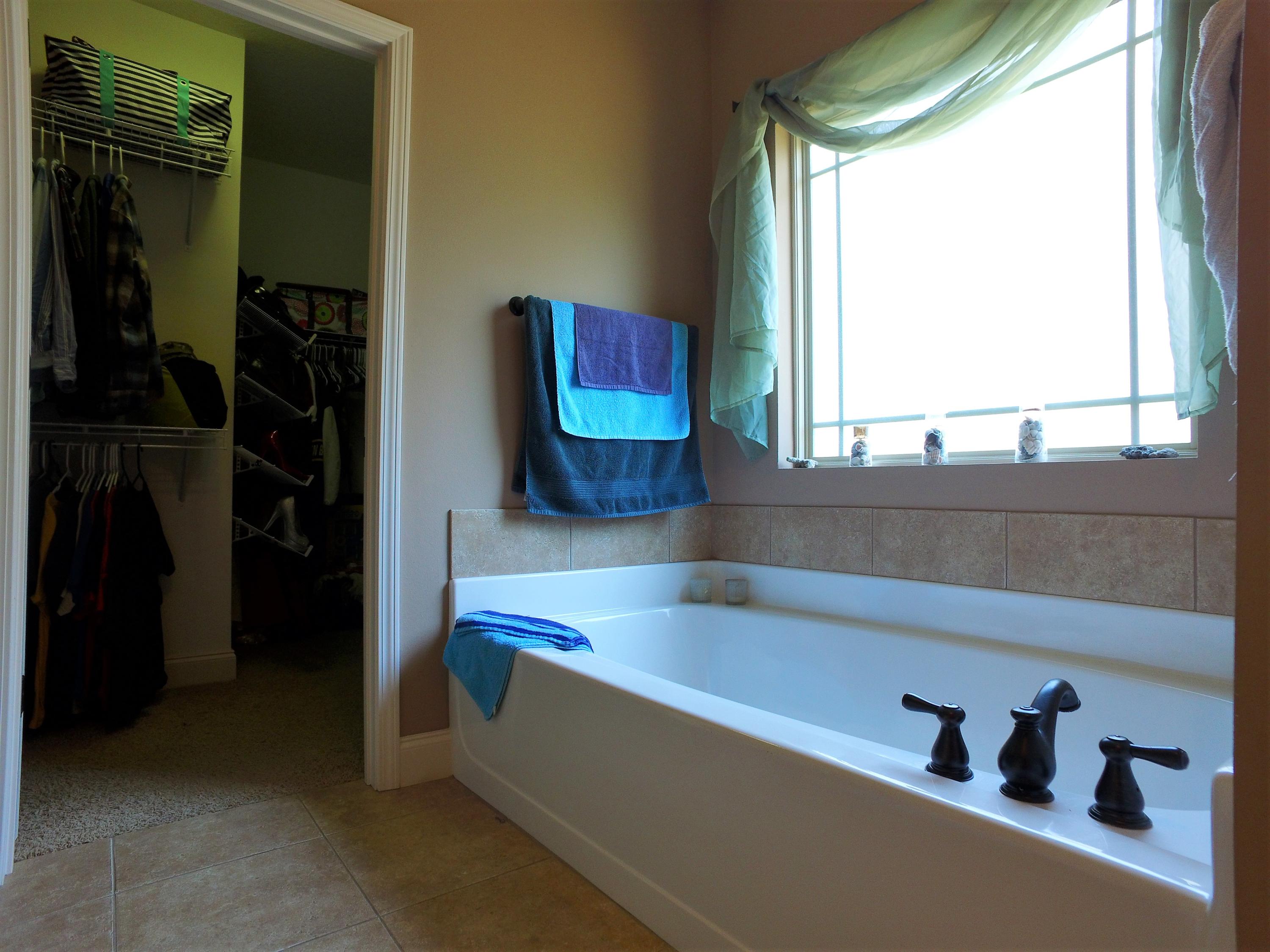 4568 Hermosa Road Crestview, FL 32539 - Photo 21 of 51 a living room with a couch and a window