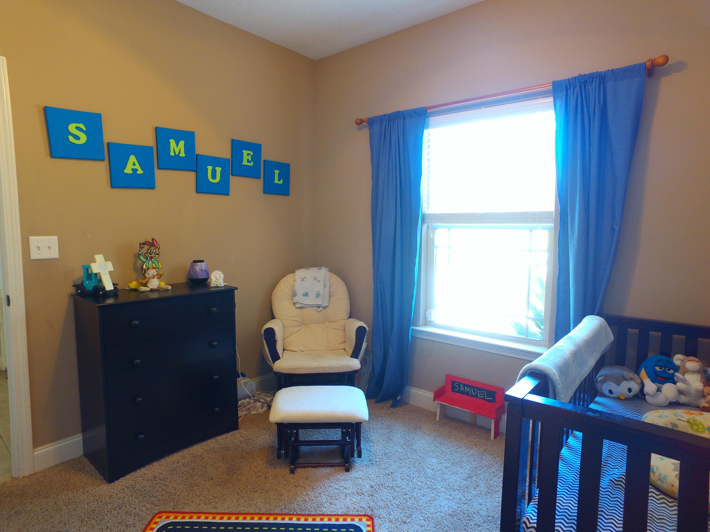 4568 Hermosa Road Crestview, FL 32539 - Photo 27 of 51 a living room with furniture a window and a potted plant