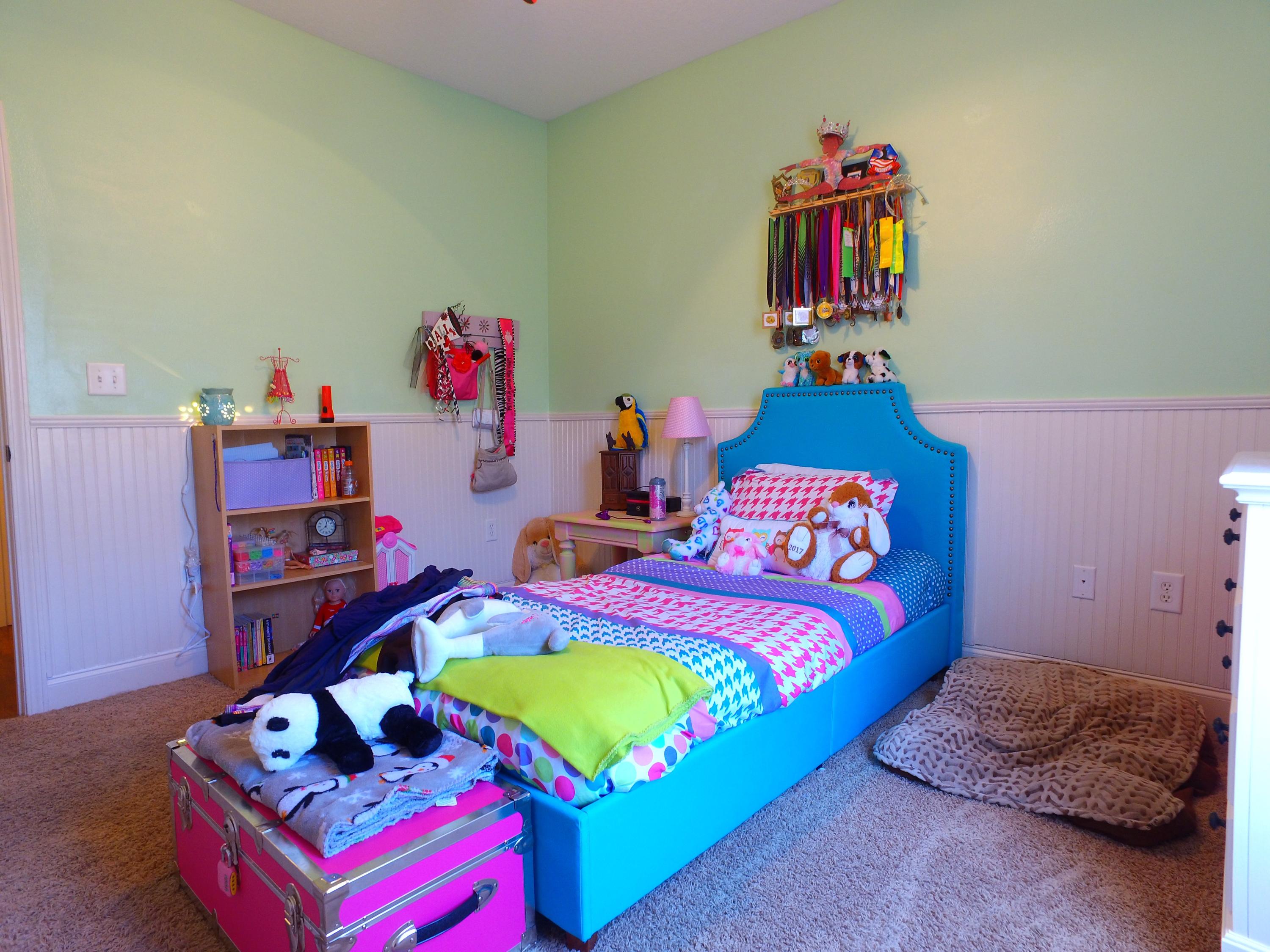 4568 Hermosa Road Crestview, FL 32539 - Photo 30 of 51 a bedroom with bed and a wooden floor