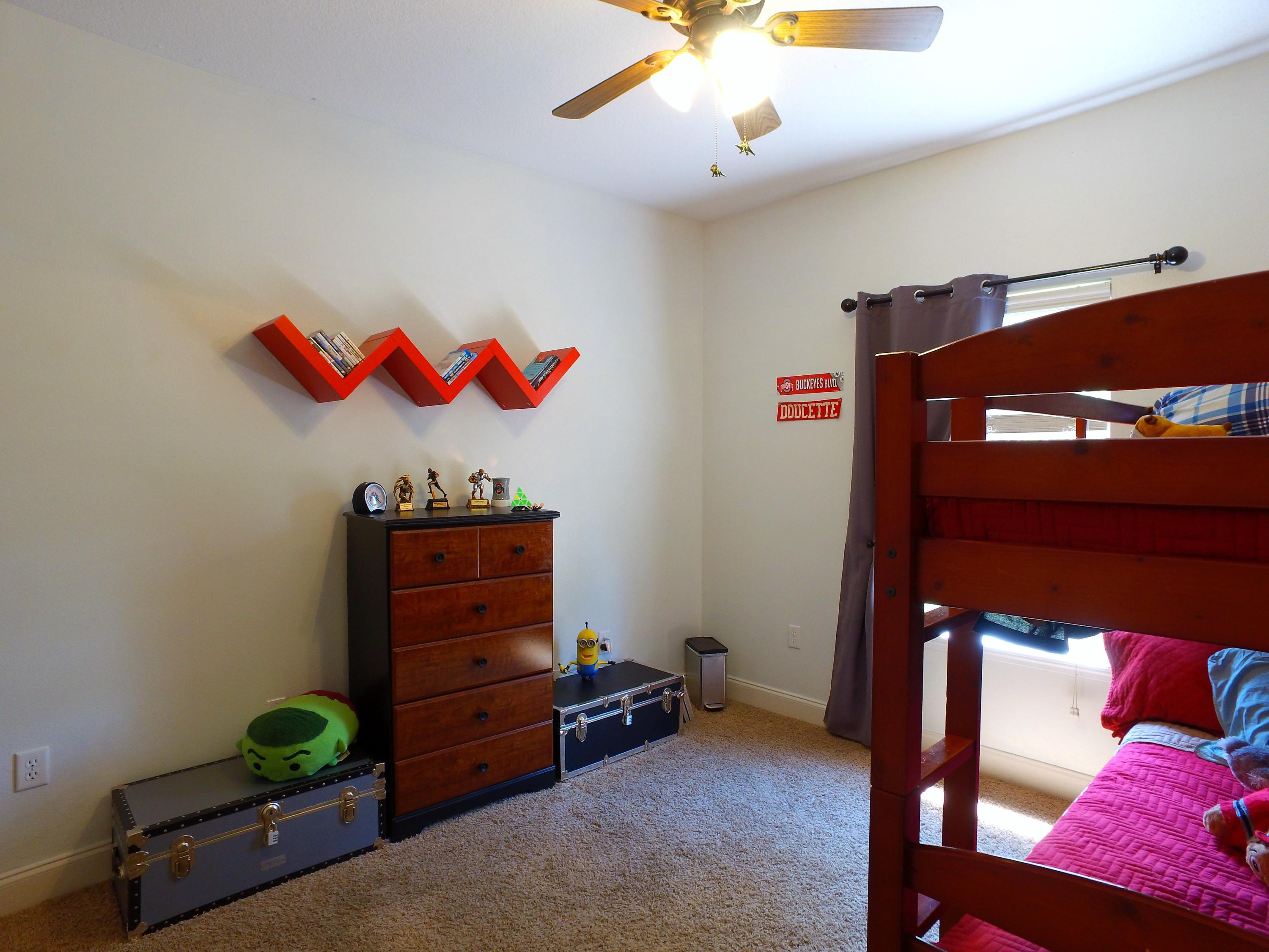 4568 Hermosa Road Crestview, FL 32539 - Photo 32 of 51 a bedroom with a bed and a dresser