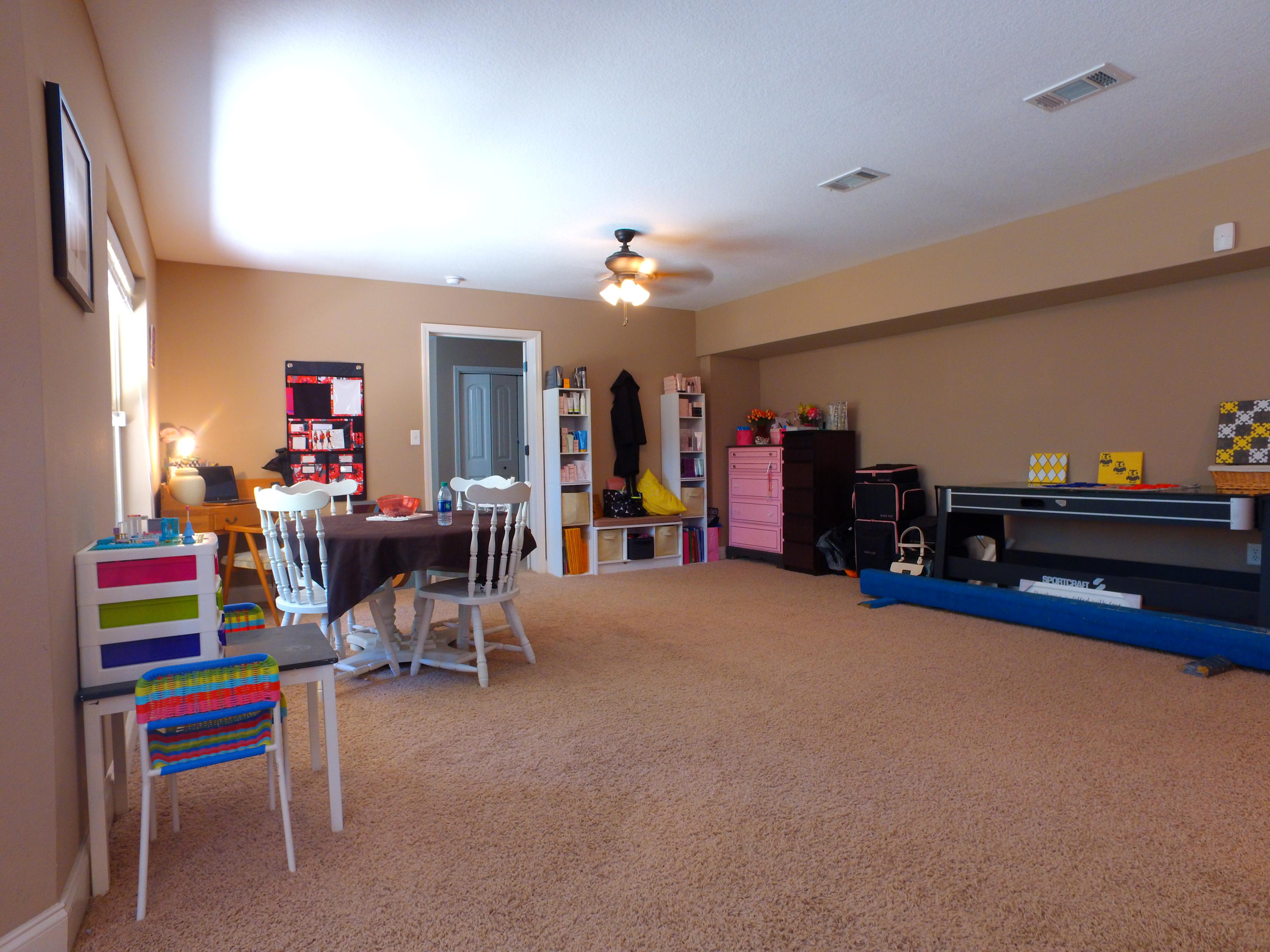 4568 Hermosa Road Crestview, FL 32539 - Photo 33 of 51 a living room with furniture and a gym equipment