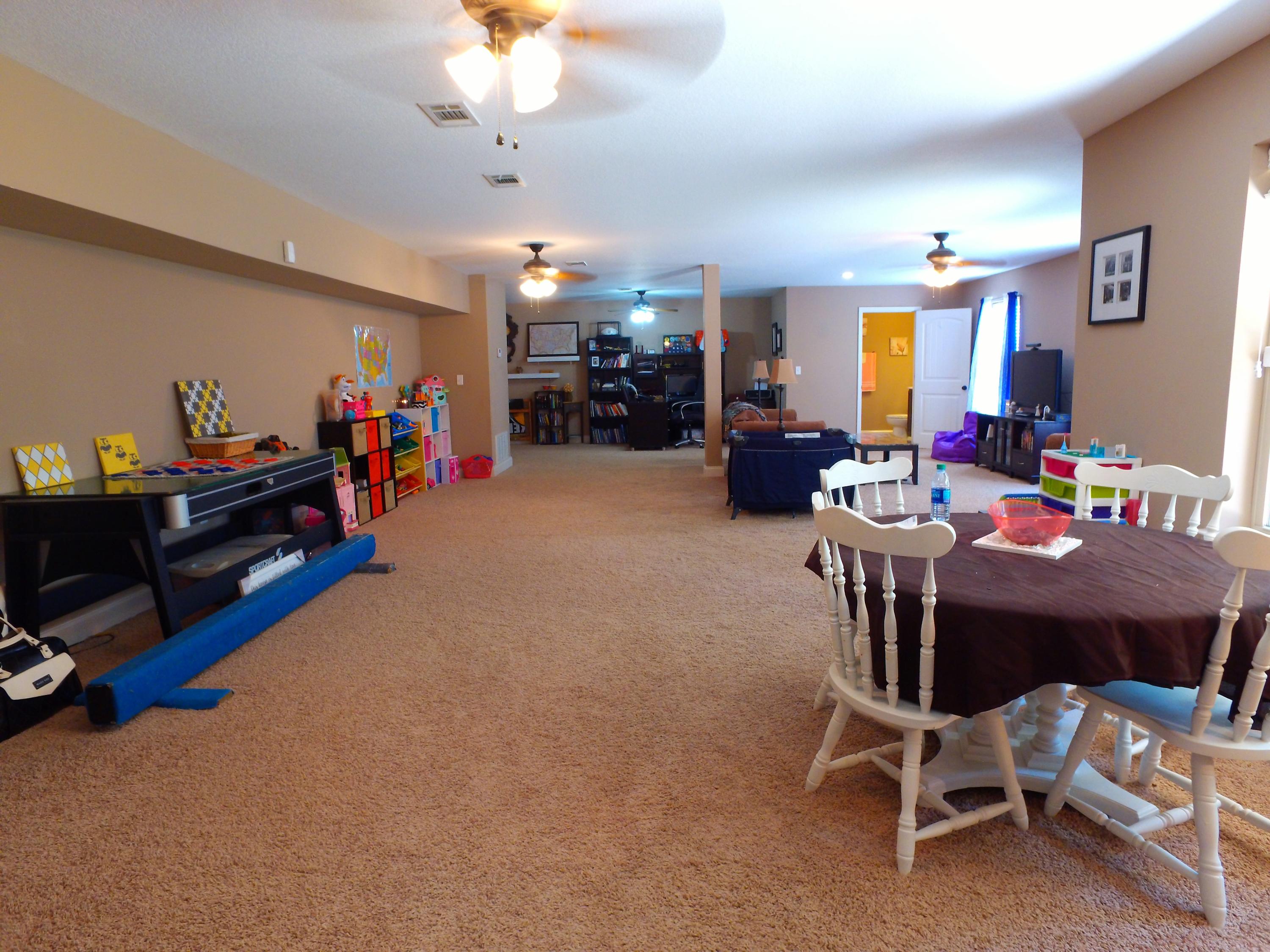 4568 Hermosa Road Crestview, FL 32539 - Photo 34 of 51 a view of a livingroom with furniture and a chandelier
