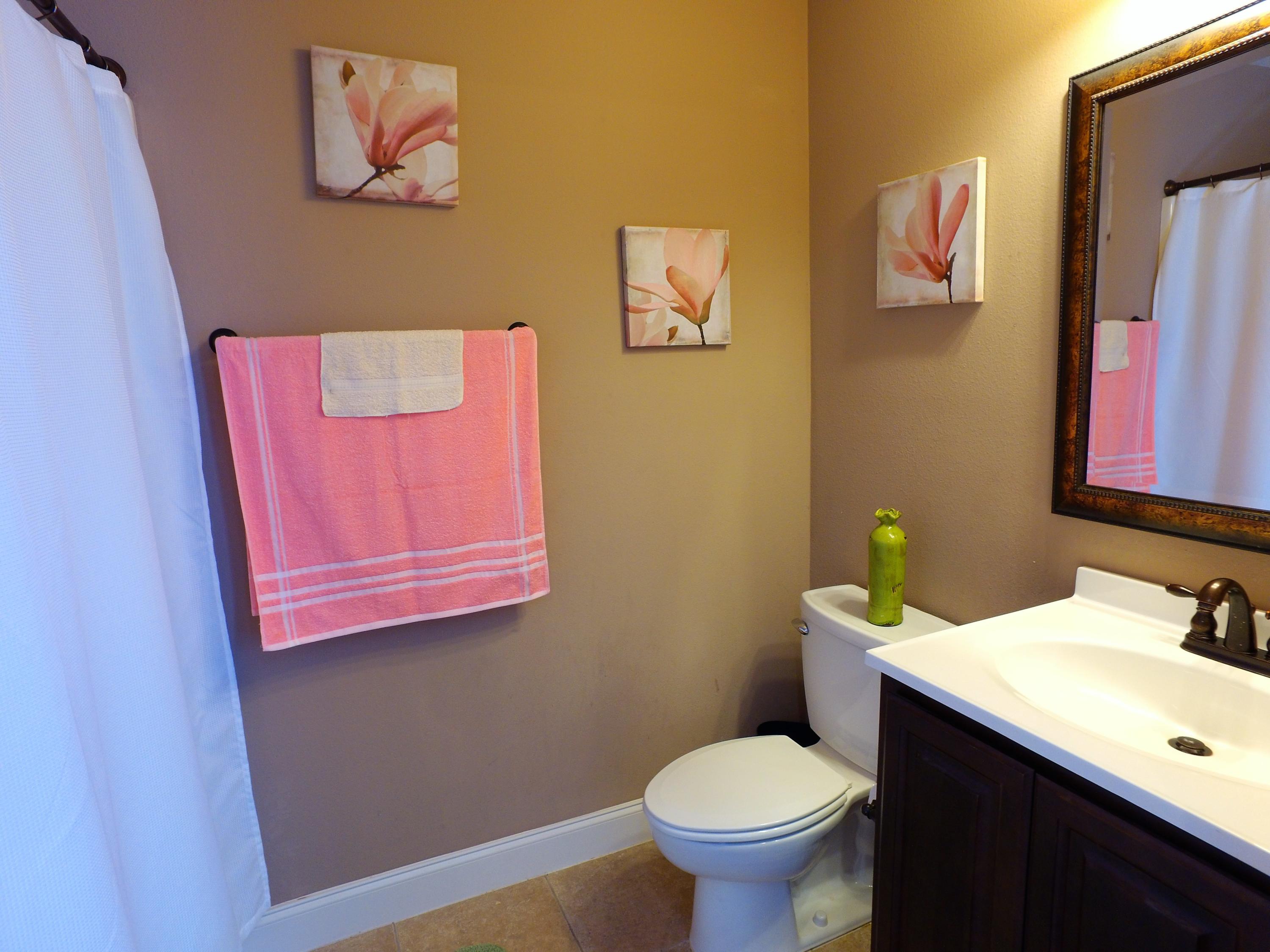 4568 Hermosa Road Crestview, FL 32539 - Photo 38 of 51 a bathroom with a sink mirror vanity and toilet