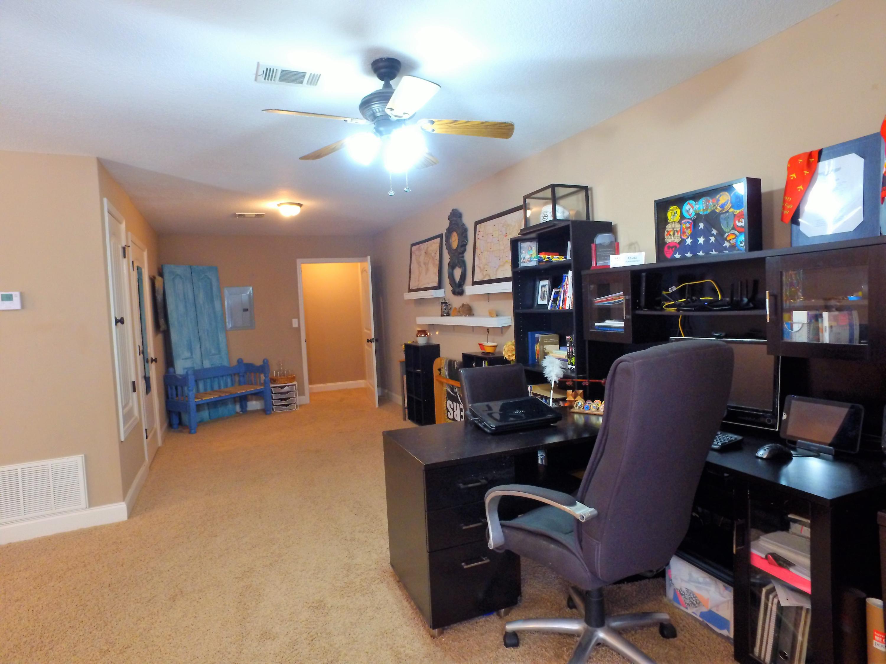 4568 Hermosa Road Crestview, FL 32539 - Photo 39 of 51 a view of a workspace with furniture and a workspace