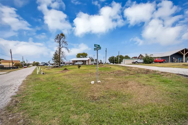 a view of a house with outdoor space and sitting area