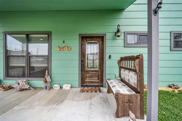 a front view of a house with a garage