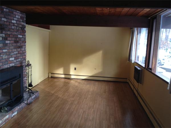 68 Sedgemeadow Road Wayland, MA 01778 - Photo 9 of 17 an empty room with wooden floor and windows