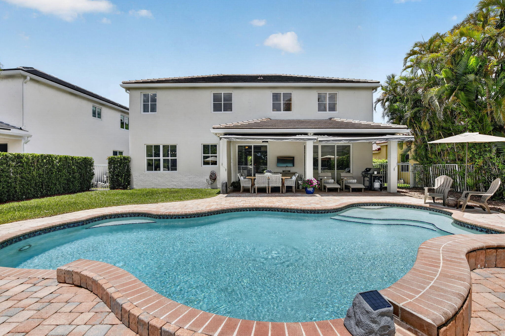 4299 Laurel Ridge Circle Weston, FL 33331 - Photo 78 of 103 a view of house with swimming pool yard and outdoor seating