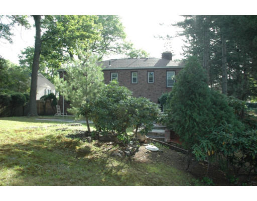 65 Oakmont Road Newton, MA 02459 - Photo 9 of 13 a view of a house with a yard