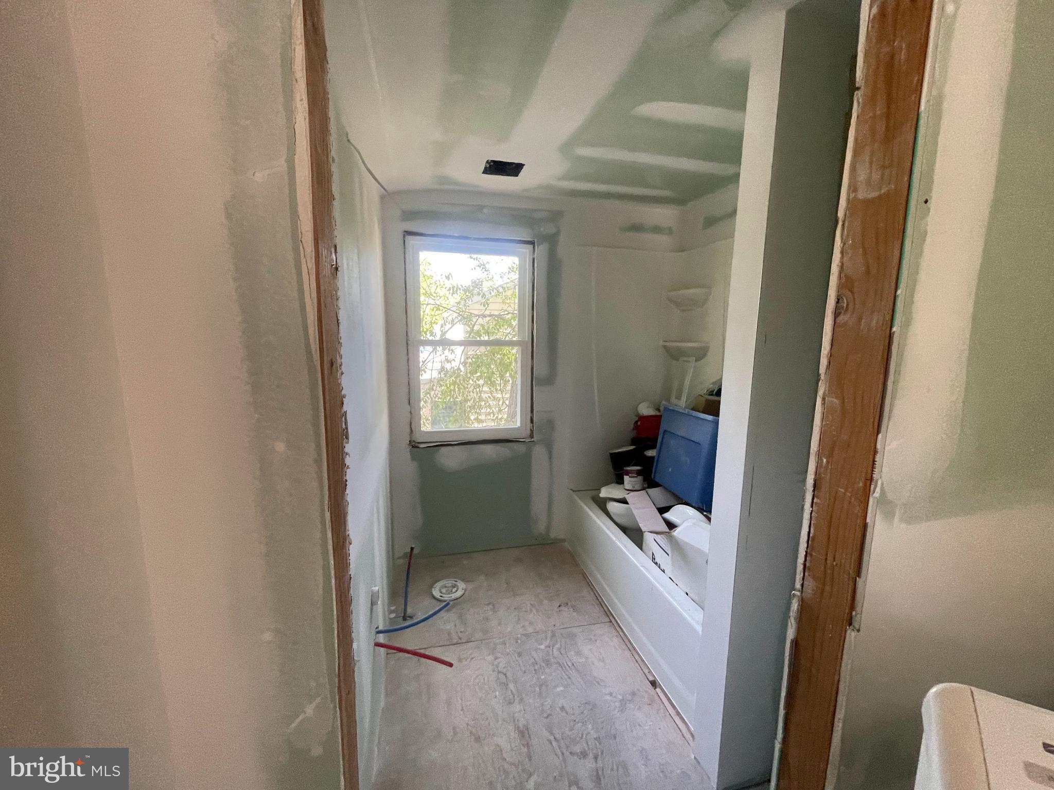 1018 West Browning Road Bellmawr, NJ 08031 - Photo 14 of 15 a bathroom with a bathtub