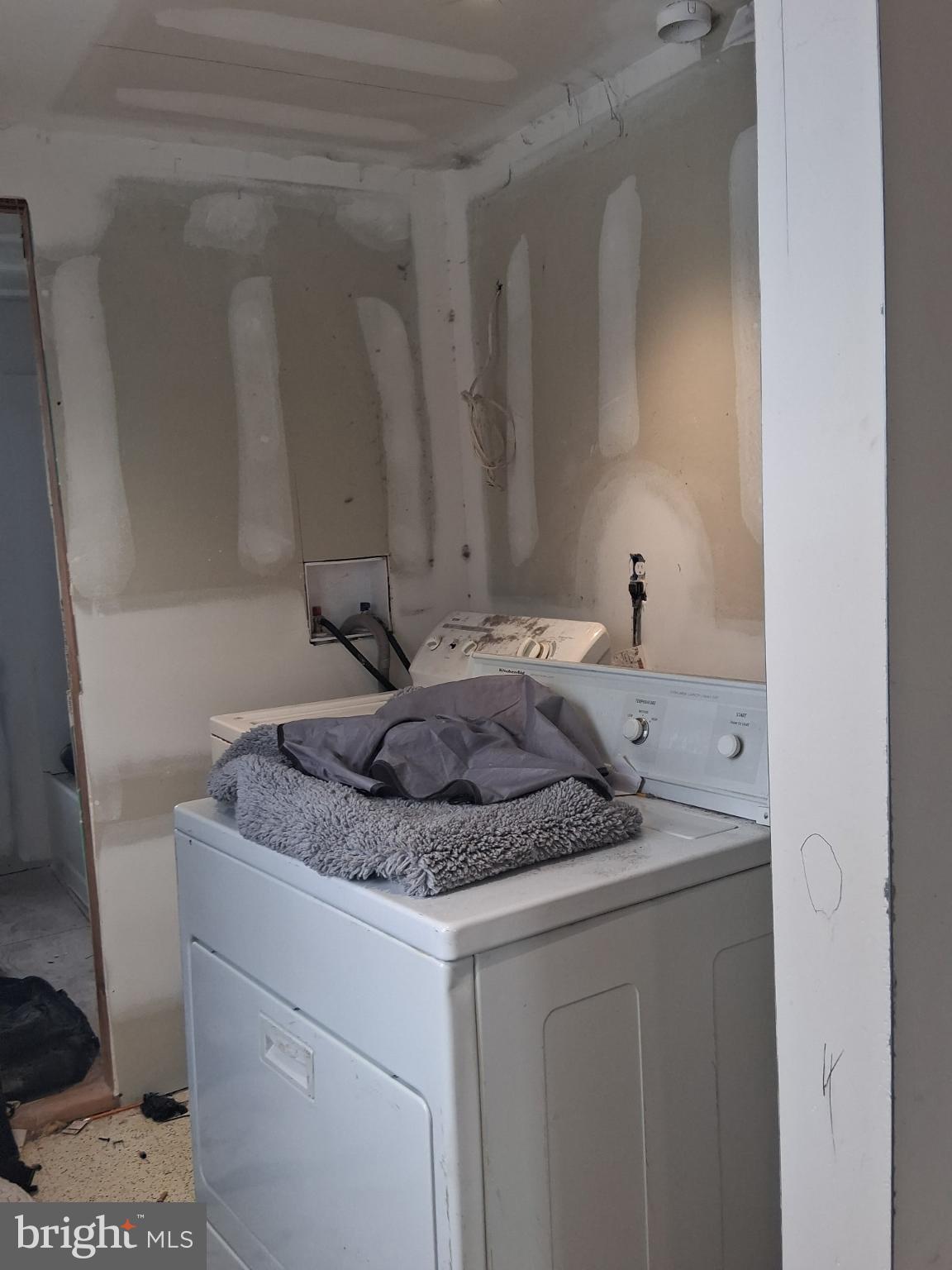1018 West Browning Road Bellmawr, NJ 08031 - Photo 15 of 15 a bathroom with a granite countertop sink and a mirror