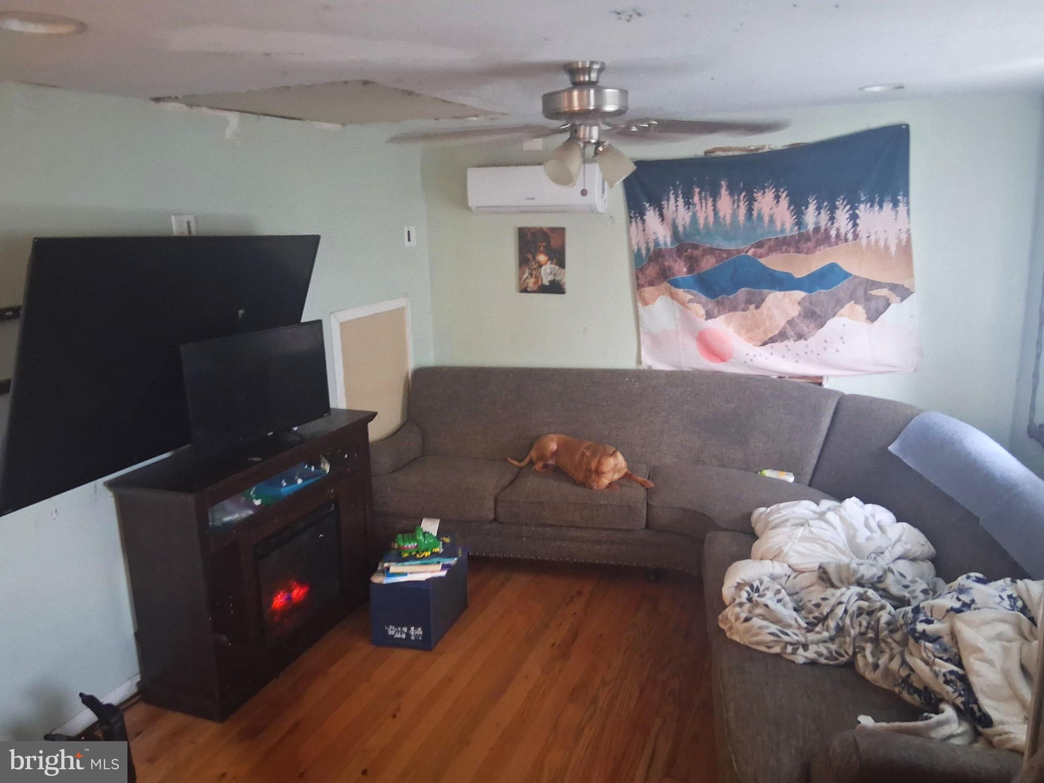 1018 West Browning Road Bellmawr, NJ 08031 - Photo 3 of 15 a living room with furniture