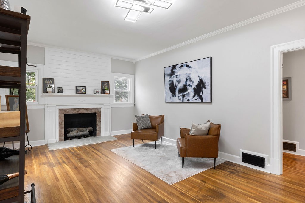 730 East Burton Street Murfreesboro, TN 37130 - Photo 5 of 22 a living room with furniture and a fireplace
