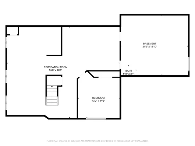 a picture of a room with a white wall and a painting