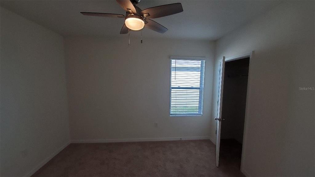 140 Old Mill Edgewater, FL 32141 - Photo 9 of 12 an empty room with a window
