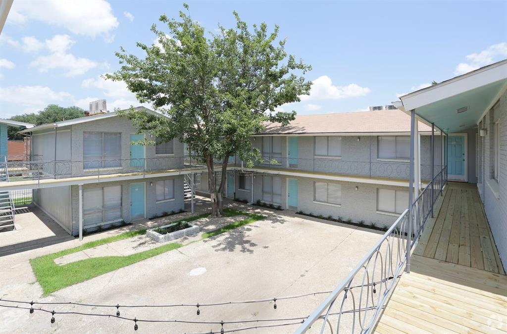 4606 Monarch Street, Unit 104 Dallas, TX 75204 - Photo 11 of 13 View of property featuring stairway