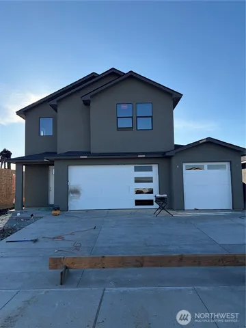 a house with wooden fence