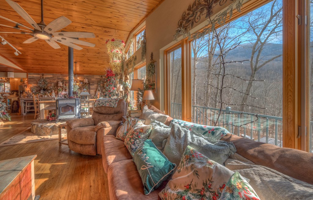 2875 Hickory Cove Murphy, NC 28906 - Photo 18 of 87 a view of balcony with couch and wooden floor