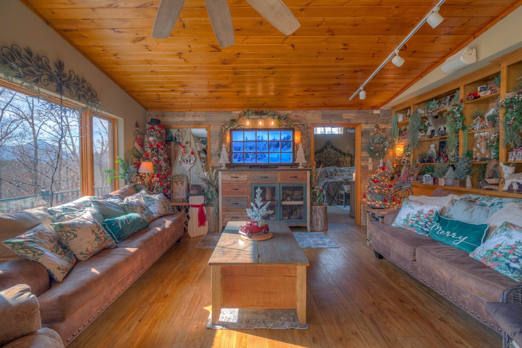 2875 Hickory Cove Murphy, NC 28906 - Photo 21 of 87 a living room with lots of furniture and wooden floor