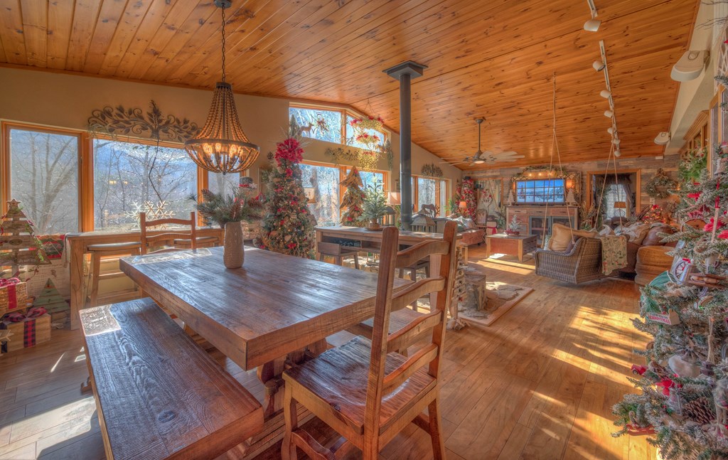 2875 Hickory Cove Murphy, NC 28906 - Photo 3 of 87 a view of a patio with a table and chairs and potted plants