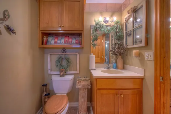 a view of a livingroom with furniture and window