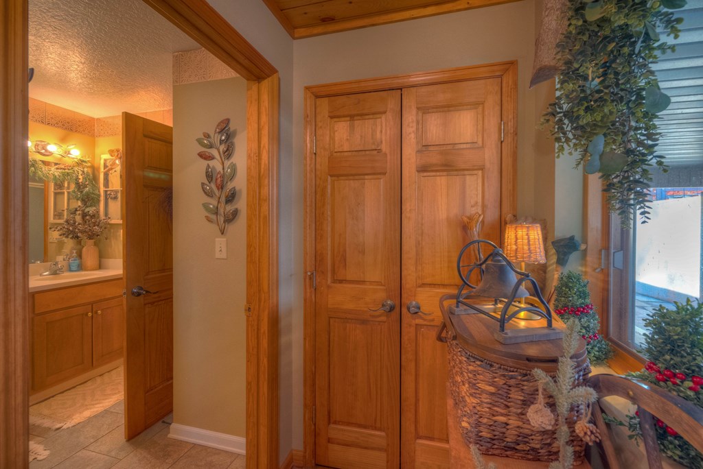 2875 Hickory Cove Murphy, NC 28906 - Photo 32 of 87 a bathroom with a granite countertop shower and a mirror