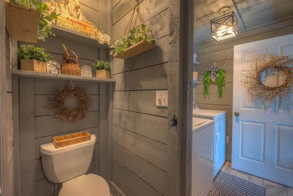 a backyard of a house with outdoor seating