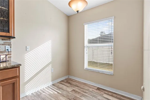 a view of a bedroom with windows