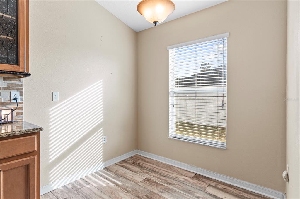 4667 Hickory Stream Lane Mulberry, FL 33860 - Photo 12 of 41 a view of a bedroom with windows