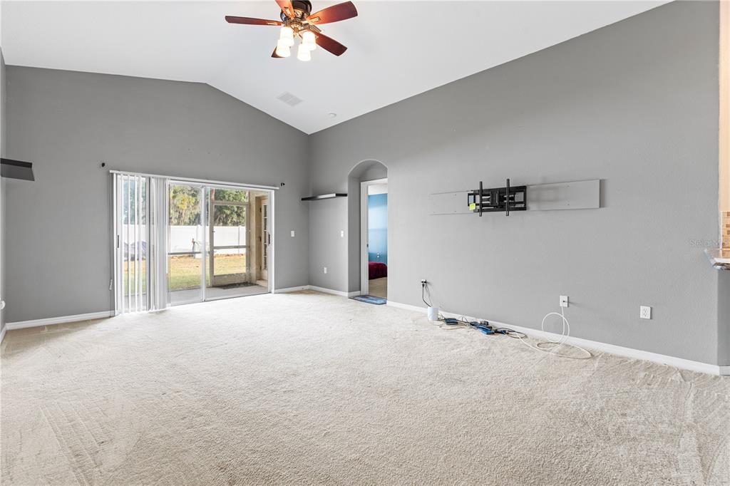 4667 Hickory Stream Lane Mulberry, FL 33860 - Photo 14 of 41 a view of an empty room with a window