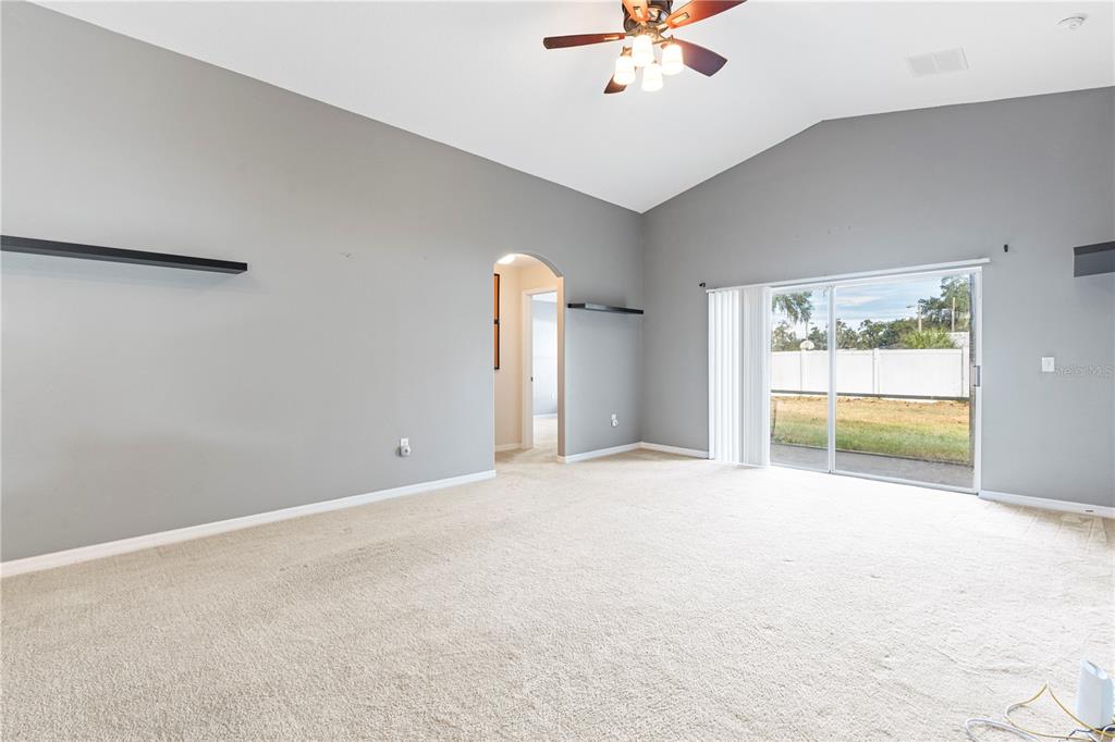 4667 Hickory Stream Lane Mulberry, FL 33860 - Photo 15 of 41 a view of an empty room with a window