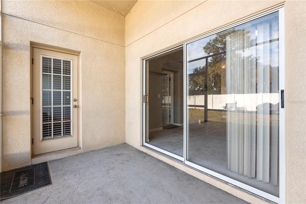 4667 Hickory Stream Lane Mulberry, FL 33860 - Photo 38 of 41 a view of a room that has a large window and wooden floor